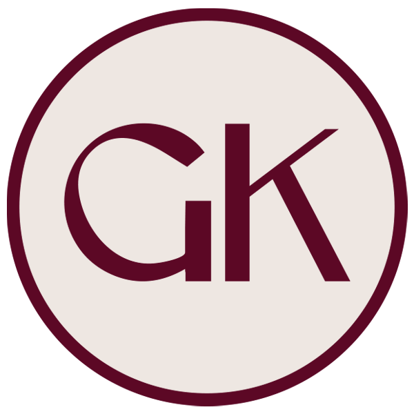 Good Kitty logo featuring the stylized letters "GK" in burgundy on a cream circular background with a burgundy border. The logo appears against a transparent checkered background.