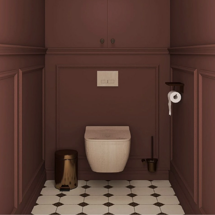 Bathroom with maroon walls, white toilet, and decorative light fixture.